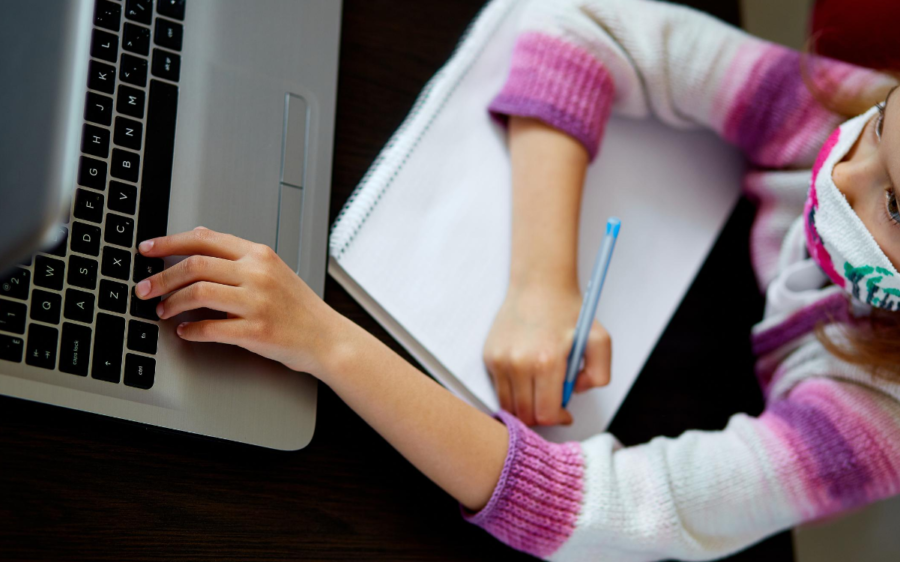 Girl Studying at Home on a Laptop