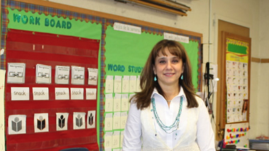 Image of Eugenia Delucca in a classroom.