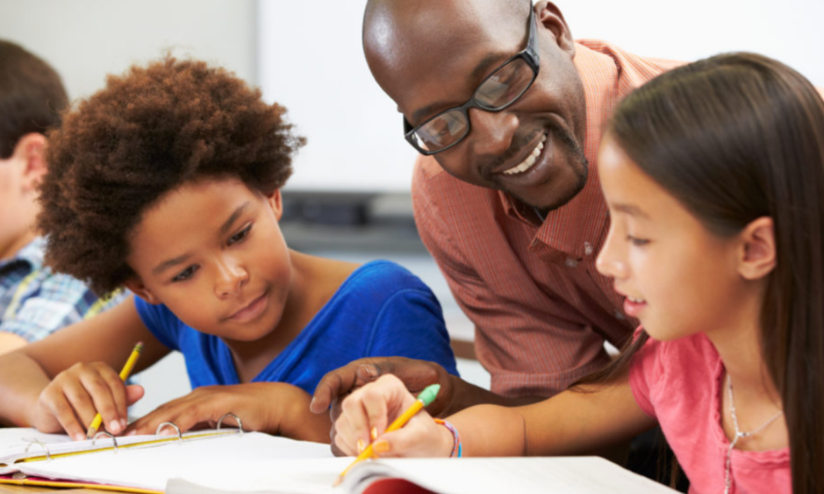 Teacher with students.