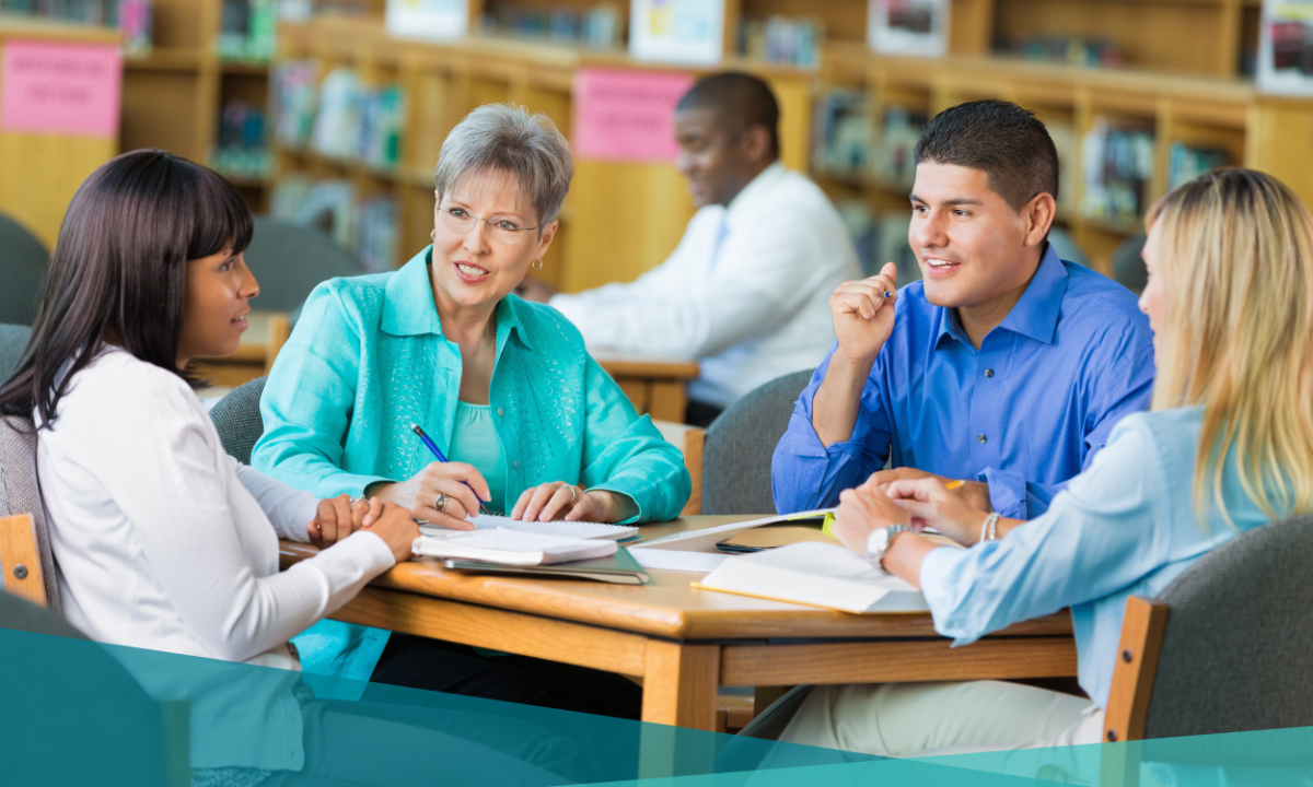 Group of educators working together around a table.