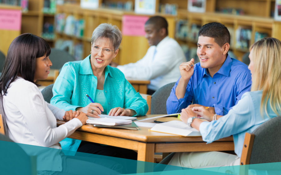 Group of educators working together around a table.